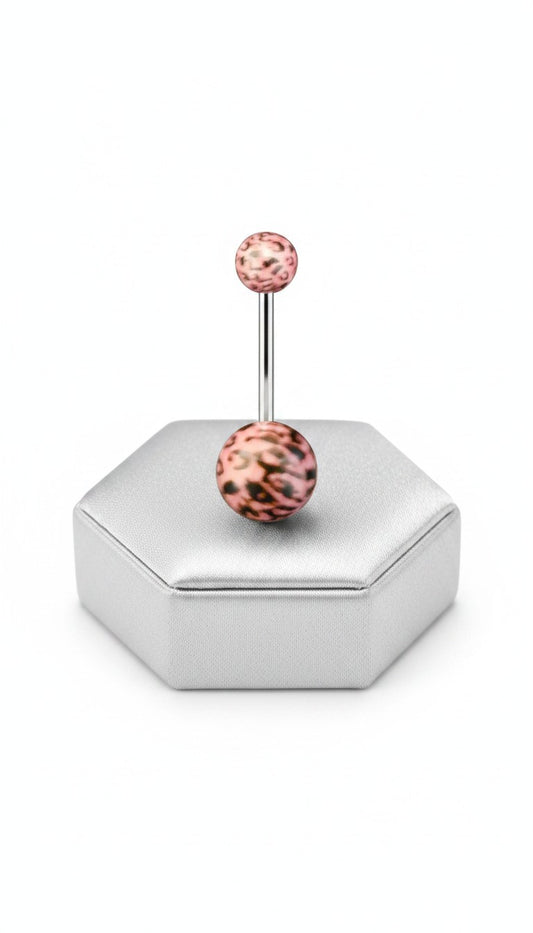 Pink Leopard Print Acrylic Belly Button Ring in 316l stainless steel on a silver jewelry display.