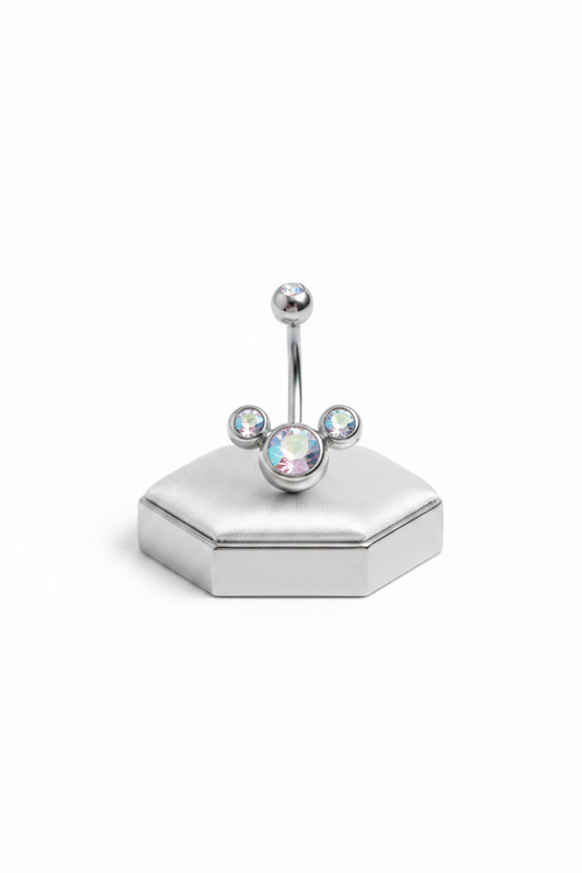 Clear Aurora Crystal Belly Button Ring in 316l stainless steel on a silver jewelry display upright position.