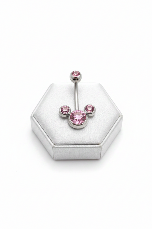 Pink Crystal Belly Button Ring in 316l stainless steel on a silver jewelry display front facing.