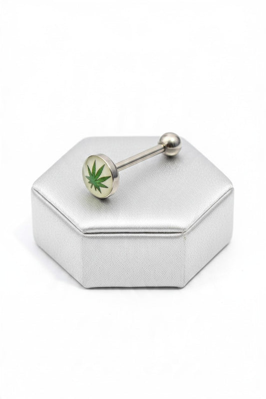 Green Leaf Tongue Barbell in 316l stainless steel on a silver silk jewelry display.